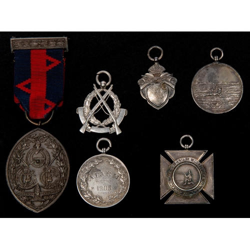 70 - A pair of shooting medals: A.I.A.R.M. 1905 with laurel spray, reverse engraved 