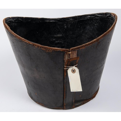 11 - An oval leather handle-less bucket, with transfer printed King's crown Royal Arms. GC (some wear)  £... 