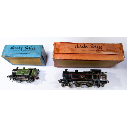 154 - 2x Hornby O gauge clockwork locomotives. A BR No.2 Special 4-4-2T loco, 6948, in lined black. An LNE... 