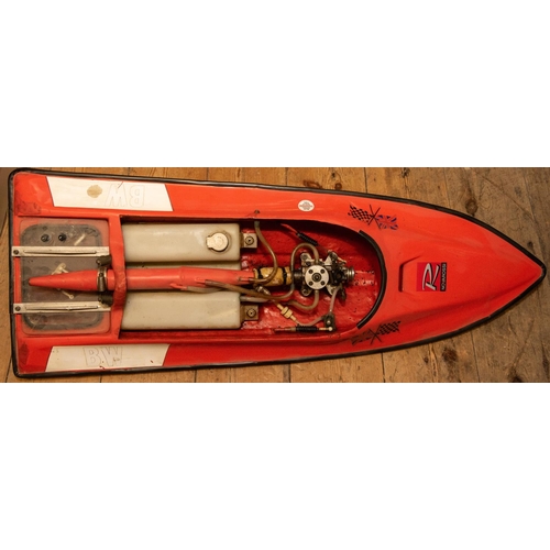 238 - A multi-racer pond boat with orange fibreglass body and fitted with a 3.5cc Novarossi glow plug (Nit... 