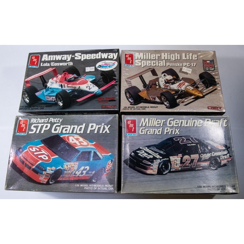 246 - 4x unmade American 1:25 AMT Plastic Race Car Kits. A Richard Petty STP Grand Prix Pontiac (#6728). A... 