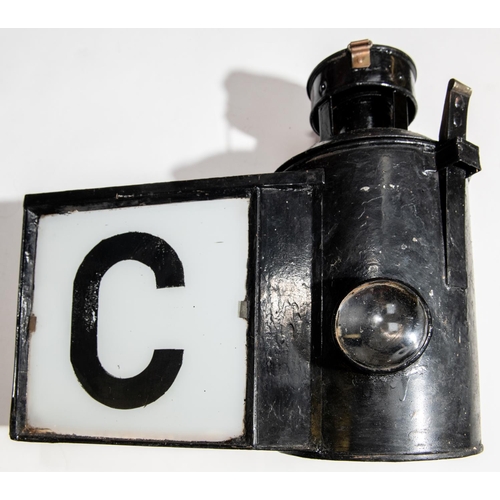 79 - 4 Railway Lamps and a Miner's Lamp. A London Midland & Scottish lamp. Lamp stamped FOR PETROLEUM ONL... 