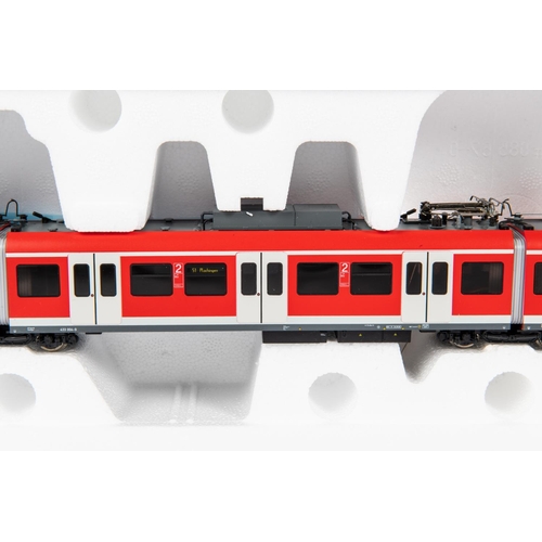 97 - A Roco 'HO' gauge DB 4-car articulated Electric Multiple Unit (63050). In red & grey livery, with in... 