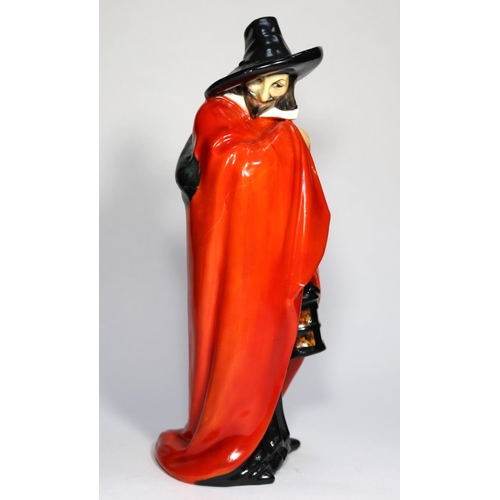 18 - A Royal Doulton 'Guy Fawkes' figurine (HN98). Designed by C.J. Noke. 270mm high. QGC-GC, cracks and ... 