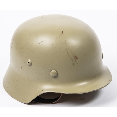 120 - A Third Reich M36 steel helmet, no decals, light grey/green finish, lining possibly post war. VGC £5... 