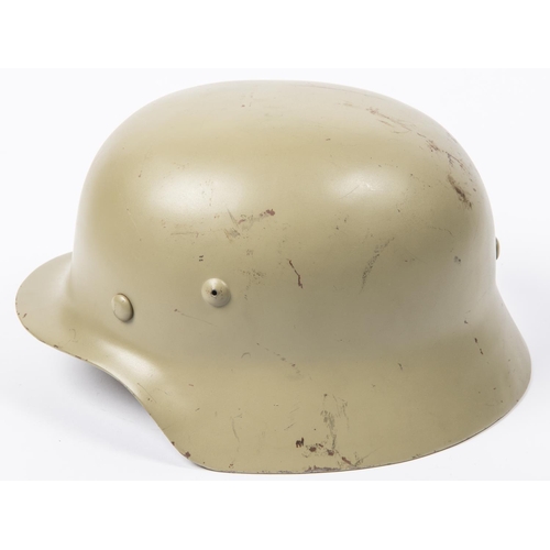 120 - A Third Reich M36 steel helmet, no decals, light grey/green finish, lining possibly post war. VGC £5... 