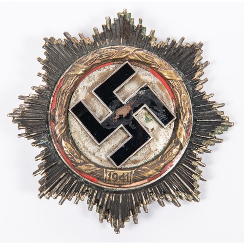 104 - A Third Reich German Cross, gilt wreath, marked on reverse 