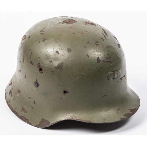 168 - A WWII vintage Spanish Army steel helmet, leather lining, olive drab finish. GC (some chips to finis... 