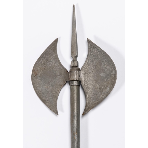 407 - An Indian double bladed steel battle axe, 27½