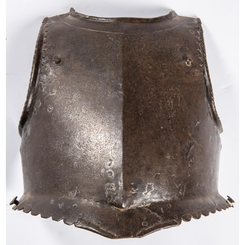 415 - An early 17th century officer’s breastplate, with rolled neck, scalloped borders, separate roped gus... 