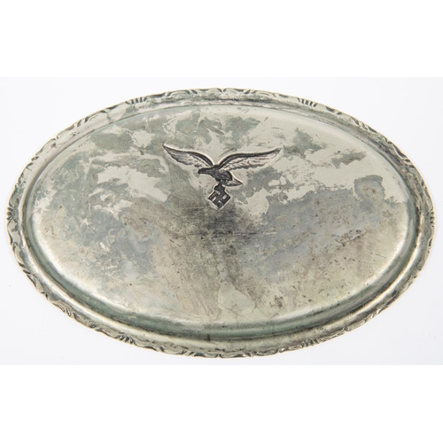 93 - A Third Reich white metal salver, with applied Luftwaffe badge, 9½