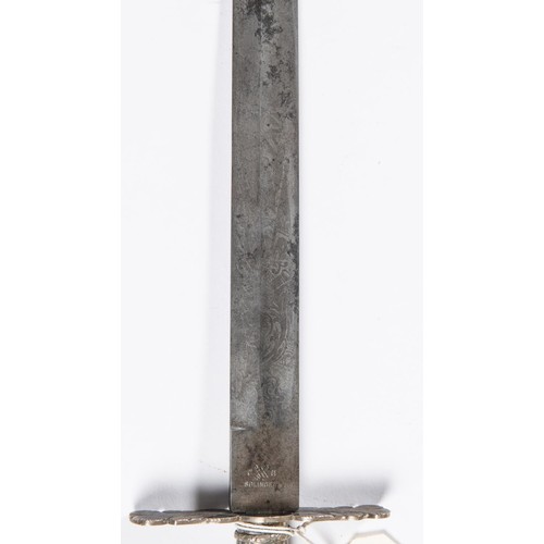 150 - A German hunting sword c 1900, SE blade 13¾” etched with trophies and foliage, marked “Toledo” and “... 