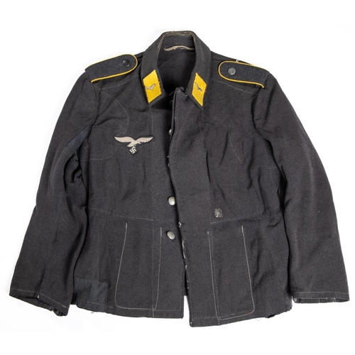 107 - A Third Reich Luftwaffe flieger blouse, complete with buttons and insignia. GC £150-200