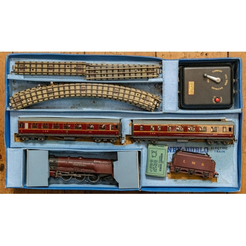 211 - A Hornby Dublo 3 rail Train Set. An EWDP2 set comprising an LMS Duchess Of Atholl tender locomotive.... 