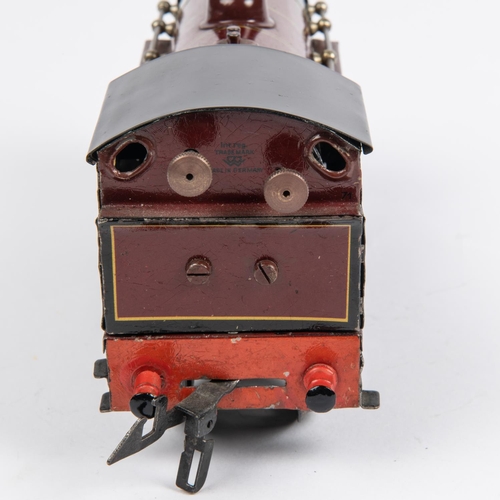 235 - A Bing O gauge clockwork LMS 0-6-0T locomotive, 47480, in lined maroon livery. Bing logo to rear of ... 