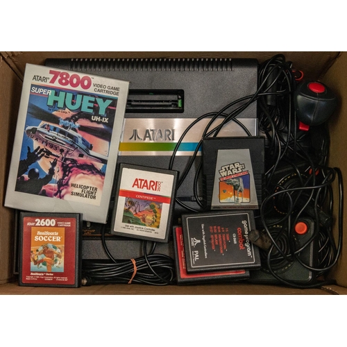 251 - 2x Atari Games consoles, etc. Including; An Atari 7800, together with an earlier 1970s Atari, 3x con... 