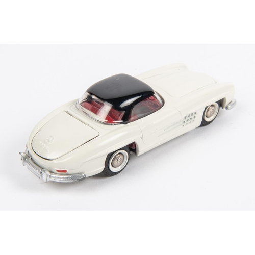 288 - Tekno (925) Mercedes-Benz 300SL. With off-white body, black roof and red interior. Boxed, minor wear... 