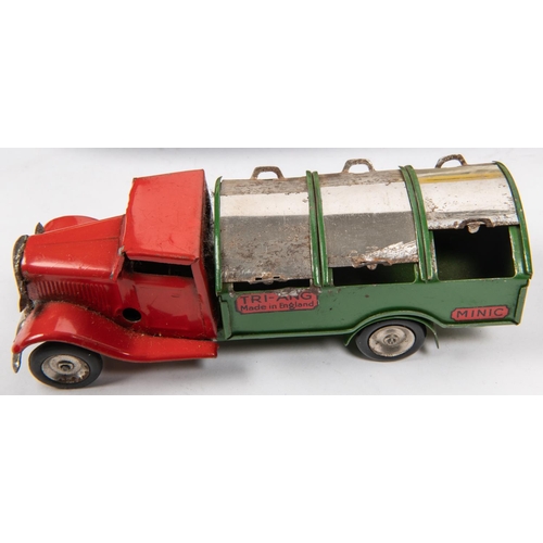 308 - 4 1950's British made items. A Lines Bros heavy duty tinplate tipping truck in red, with black rubbe... 