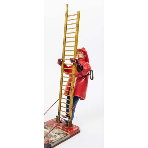 309 - 2 MARX Toys. 'The Climbing Fireman' (Smokey Joe). An American style fireman (20cm) in red plastic wi... 