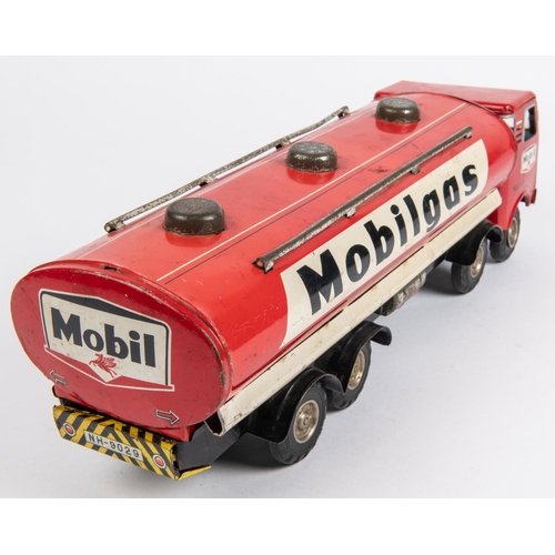 313 - A 1960's Japanese tinplate 8 wheeled Mobilgas tanker by Horikawa. No.159, in  red and white livery, ... 