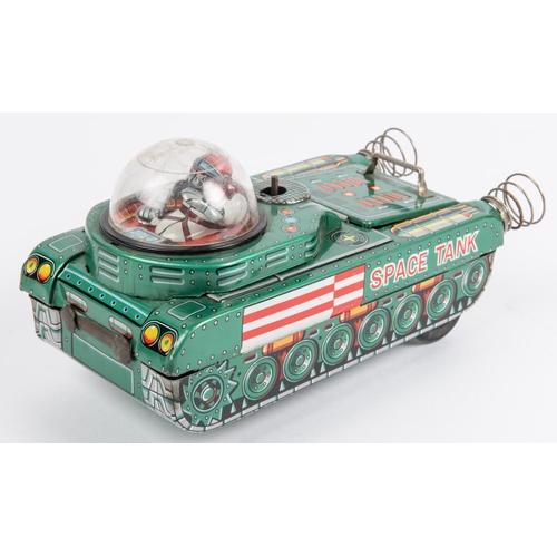 315 - A Modern Toys battery powered with mystery action tinplate M-18 Space Tank. Finished in metallic gre... 