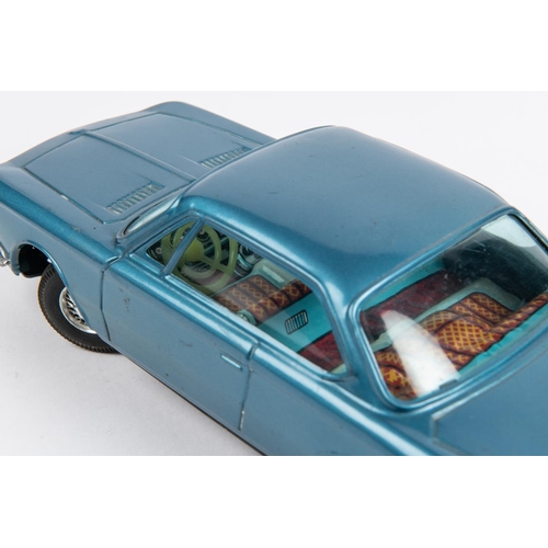 316 - Bandai tinplate BMW CS. An example in light metallic blue with litho detailed interior, umbilical co... 