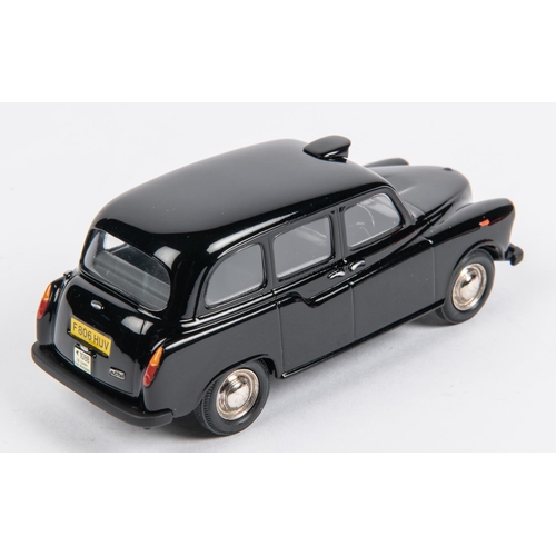 367 - Somerville Models No.100A.  Austin FX4 TAXI. Finished in black with grey interior. Boxed, with packi... 