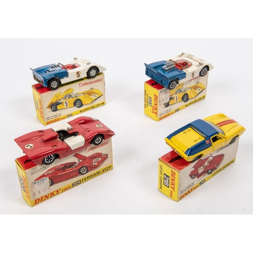 467 - 4x Dinky Toys. 2x McLaren M8A Can Am (223) both in blue and white. A Lotus Europa (218) in yellow an... 