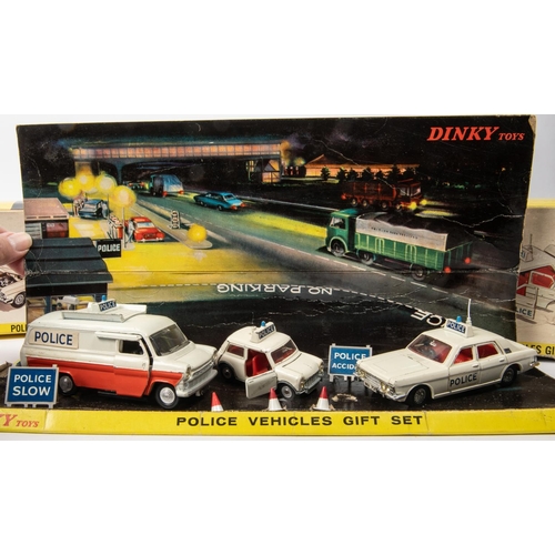 476 - 2 Dinky Toys POLICE Vehicles Gift Set 297. Comprising Ford Transit, Mini Cooper 'S' and a Ford Zodia... 