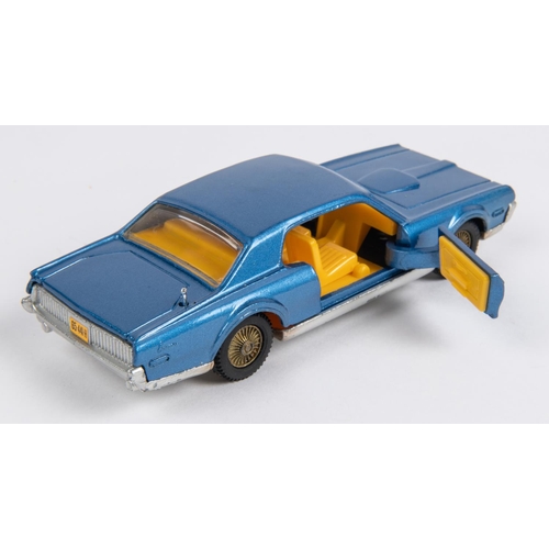 487 - Dinky Toys Ford Mercury Cougar (174). In metallic blue with yellow interior and gold coloured cast w... 