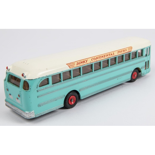 491 - Dinky Supertoys Continental Touring Coach (953). In turquoise with a white roof, fawn interior with ... 