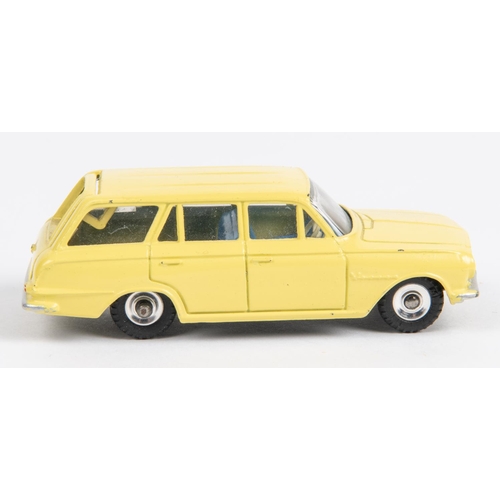 492 - A Dinky Toys Vauxhall Victor estate car (141). In yellow with blue interior. Boxed, minor damage to ... 