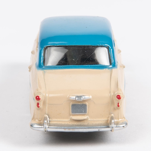 493 - Dinky Toys Austin A105 Westminster (176). A scarce example in cream with mid blue flash and roof, pl... 