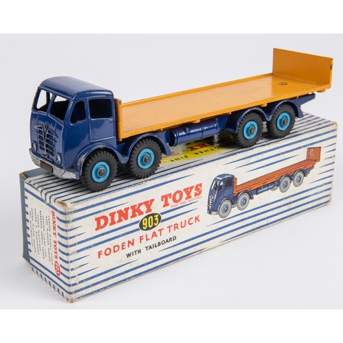 494 - Dinky Toys Foden Flat Truck with Tailboard (903). Example in violet blue with orange flatbed with mi... 