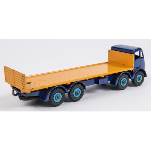 494 - Dinky Toys Foden Flat Truck with Tailboard (903). Example in violet blue with orange flatbed with mi... 