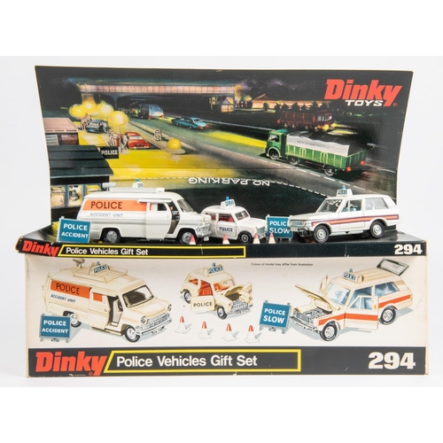 495 - A Dinky Toys Police Vehicles Gift Set (294). Police Mini Cooper (250), Police Patrol Range Rover (25... 