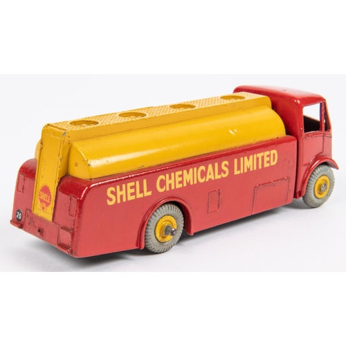 496 - Dinky Toys AEC Monarch Tanker (591). In Shell Chemicals Ltd red and yellow livery, with yellow wheel... 