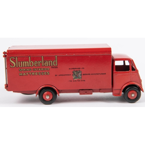 497 - Dinky Supertoys Guy Van (514). In Slumberland red with red wheels, complete with both rear doors. Bo... 