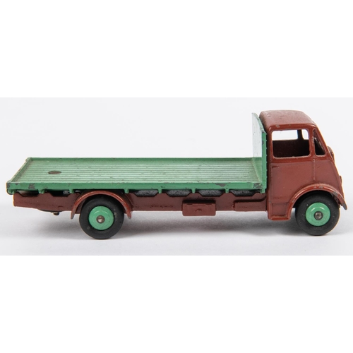 498 - Dinky Supertoys Guy Flat Truck (512). An early example made for 1 year only in 1948. Dark brown cab ... 