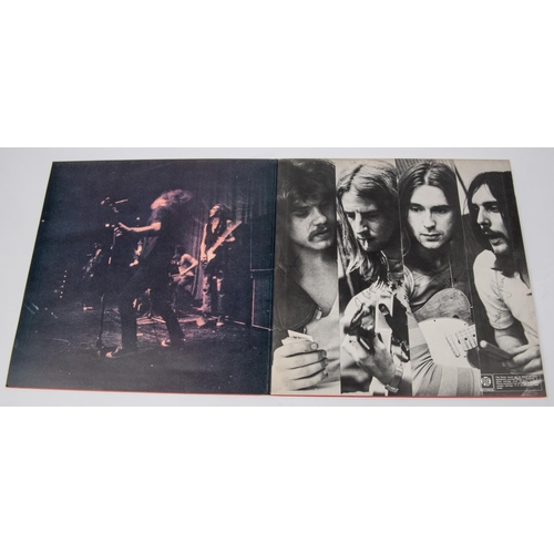 67 - Status Quo signed LP record album; Dog of Two Head. Signed inside gatefold over each photograph by; ... 