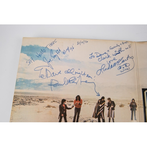 72 - Wings (Paul and Linda McCartney) signed LP record album. Signed inside gatefold cover by Paul McCart... 