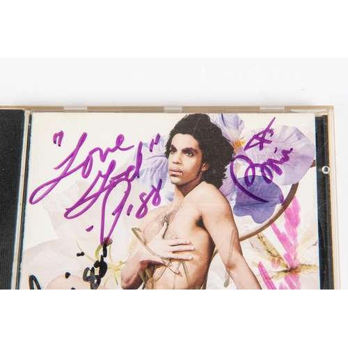 74 - A Prince CD album, Love Sexy. Signed to the cover booklet by Prince and some band members including;... 