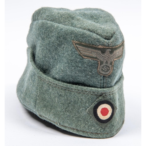 117 - A Third Reich ORs FS cap, bevo type eagle and roundel badges, one small area of mothing to pile, oth... 