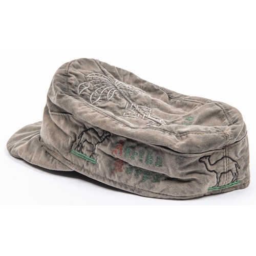 118 - A Third Reich Tropical service peaked field cap, embellished with Afrika Korps designs inside and ou... 