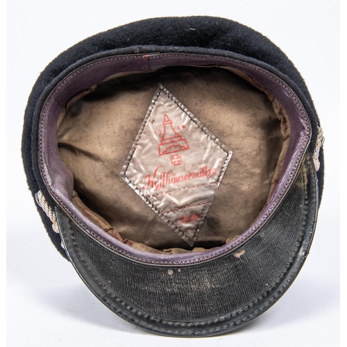 122 - A Third Reich Veterans' Organisation S.D. cap, alloy eagle, wreath and braid chin strap, lining has ... 