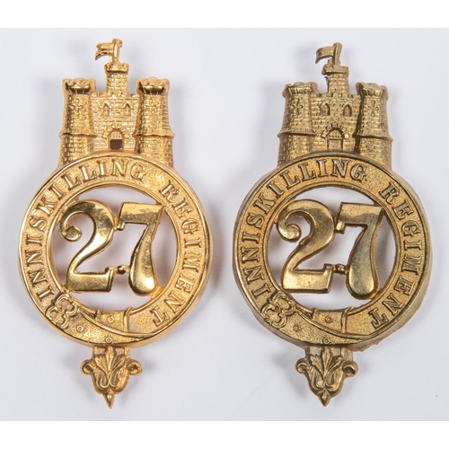 145 - A pre 1881 brass glengarry badge of the 27th Inniskilling Regiment, GC; and a similar reproduction g... 