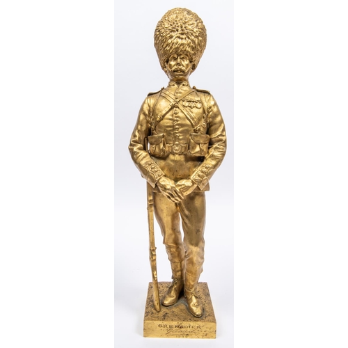 45 - A pair of well executed brass figures of Grenadier Guardsmen, 1815 and 1889, height 17½, signed G E ... 