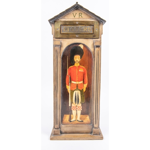 59 - A late 19th century painted oak post box in the form of a sentry box, the front with a brass post sl... 