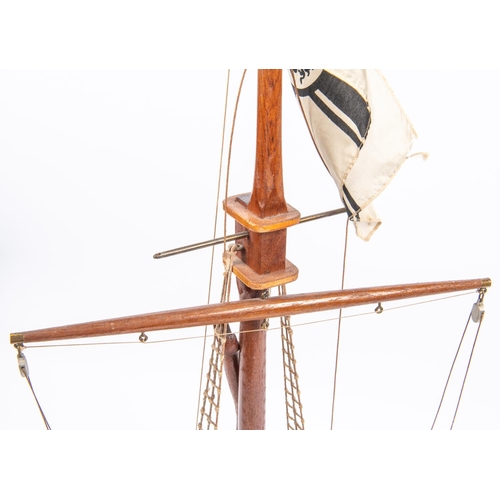 64 - An Imperial German nautical desk ornament in the form of a partly rigged mast flying naval ensign, v... 