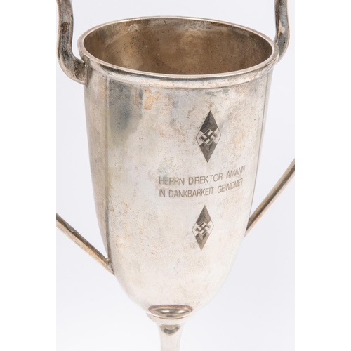 65 - A Third Reich silver plated prize cup, engraved with Hitler Youth badges and on one side 